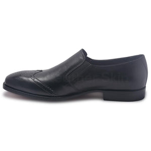 black wingtip leather shoes