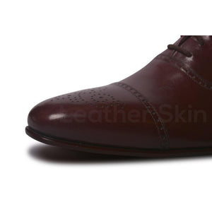 Brogue Design on Red Leather Shoe Toe