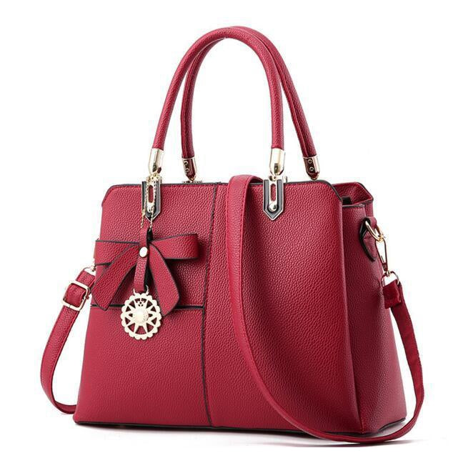 Three Color Combo Faux-Leather Tote Shoulder Bag with a Solar Symbol Tassel