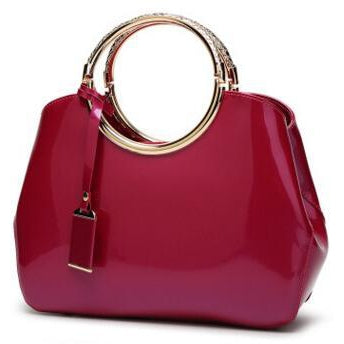 Women Shiny Glossy Faux-Leather Handbag with a Decorative Brass Buckle -  Leather Skin Shop