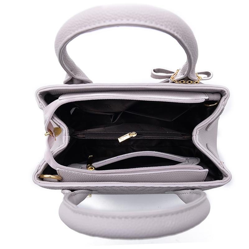 Women Quilted Faux-Leather Handbag with a Heart Shaped Tassel