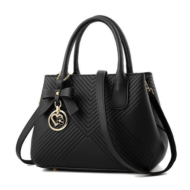 Women Quilted Faux-Leather Handbag with a Heart Shaped Tassel