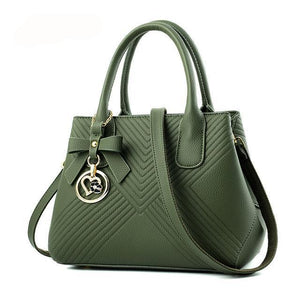 Women Quilted Faux-Leather Handbag with a Heart Shaped Tassel