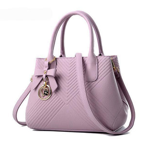 Women Quilted Faux-Leather Handbag with a Heart Shaped Tassel