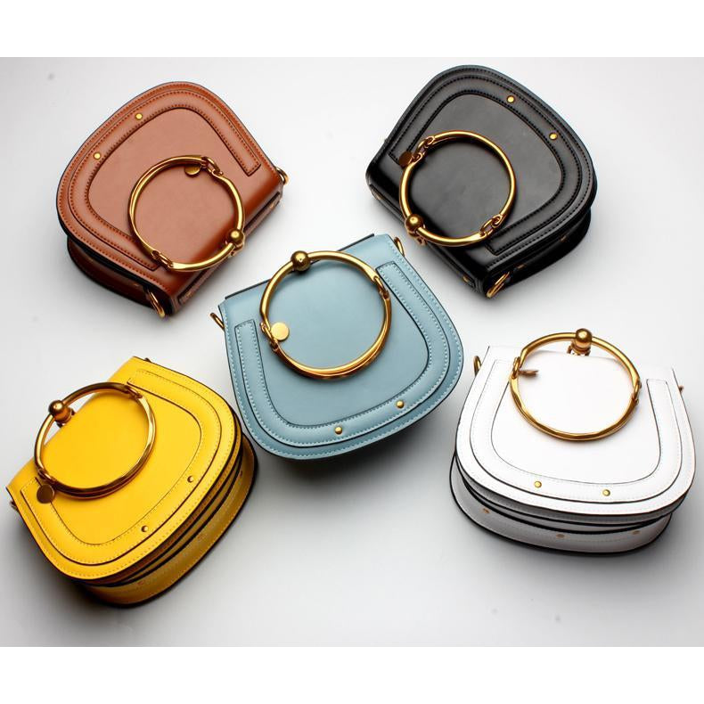 Women Saddle Faux-Leather Bag with Brass Buckle Design