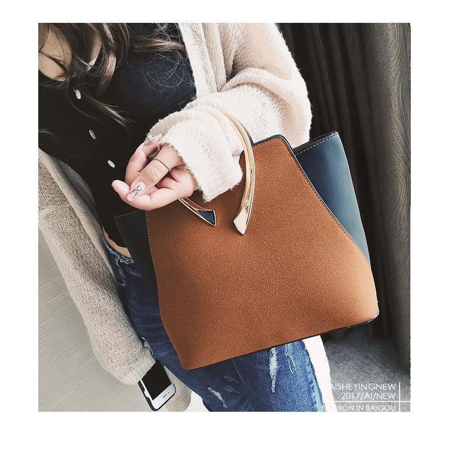 Women Brown Tote Leather Handbag in women hand