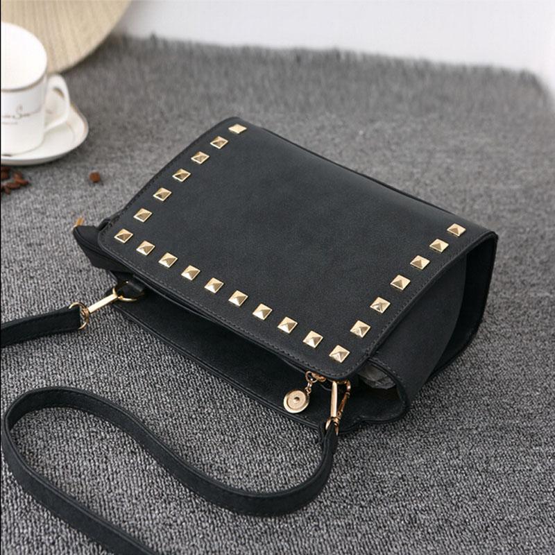 Leather bag with outlet studs