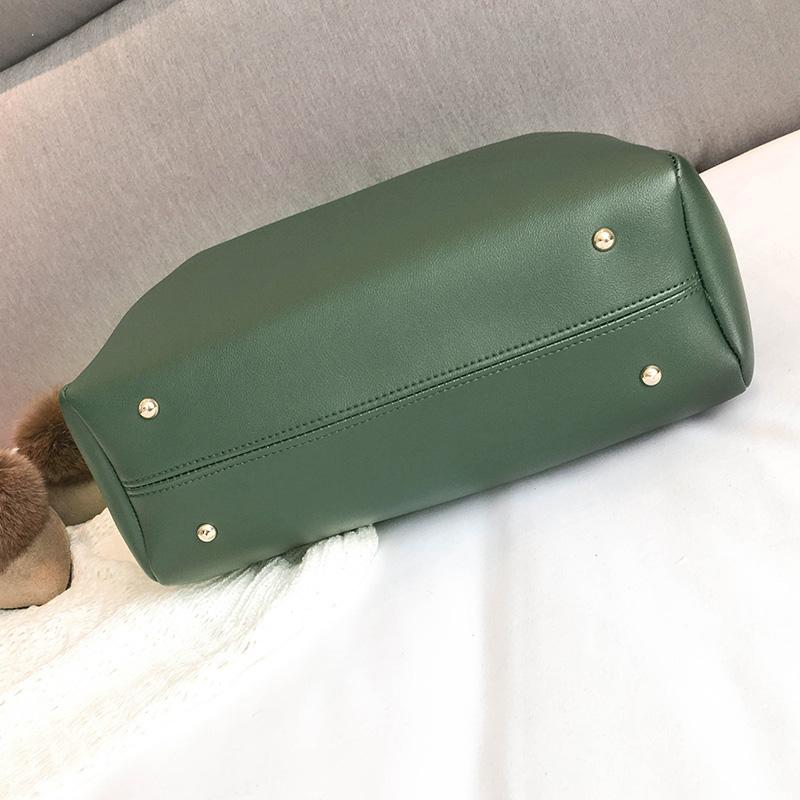 A Perfect Tote Genuine Leather Shopping Bag with a Bucket Shaped Design