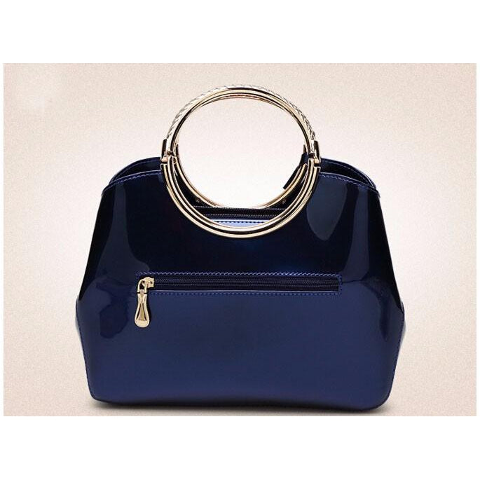 Women Shiny Glossy Faux-Leather Handbag with a Decorative Brass Buckle -  Leather Skin Shop