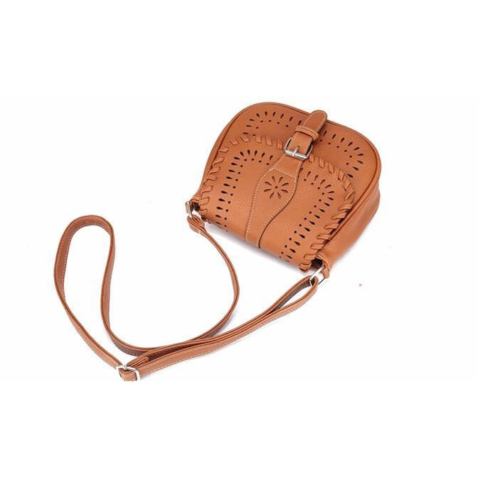 Brown Color Crossbody Messenger Handbag Lying on white sheet